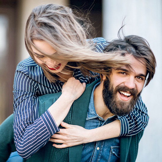 Woman hugging man