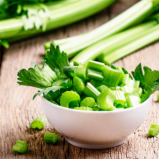 Celery is rich in nutrients Bowl filled with chopped celery stalks