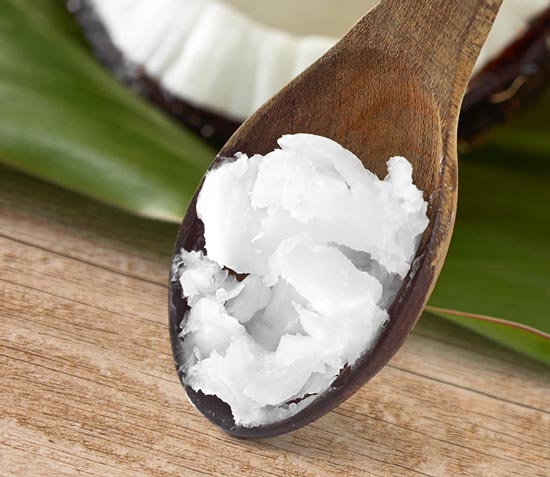 Coconut on a wooden spoon