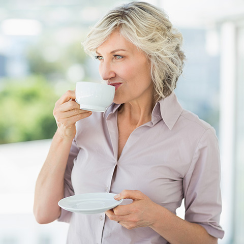 Woman drinking coffee