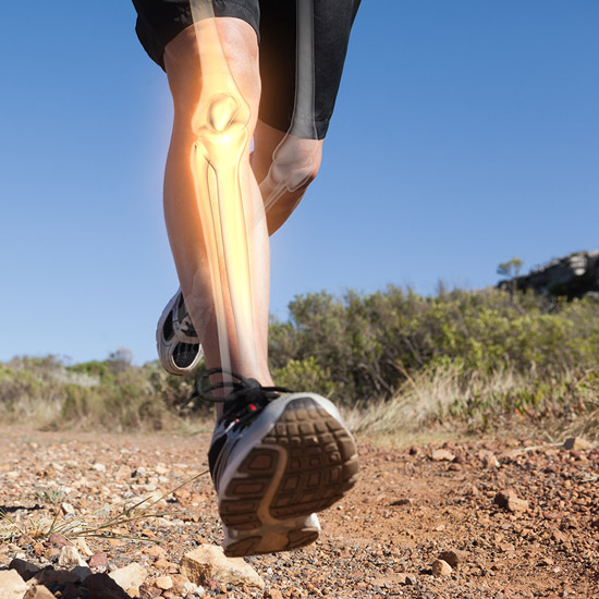 Close-up running legs